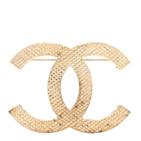 chanel light gold cc twist brooch|chanel quilted brooch.